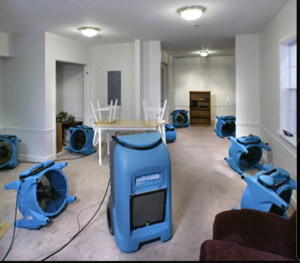 Air movers and dehumidifier setup for Water Extraction & Removal in Champlain